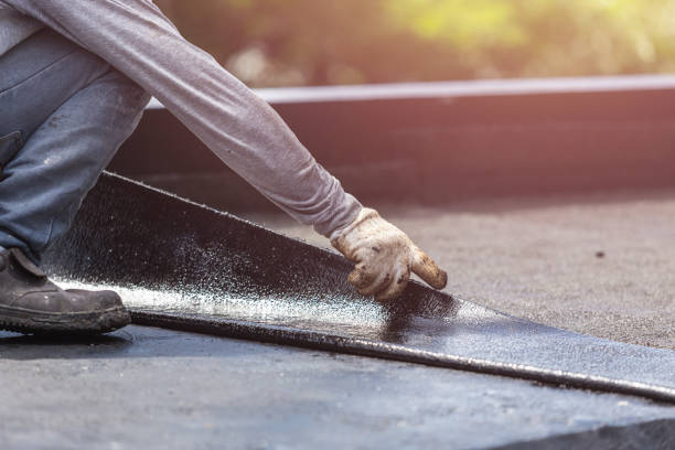 Professional Basement Waterproofing technician working in Reading, OH